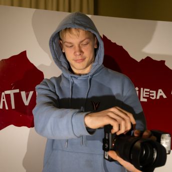 Dziesmu vakars klusinātā gaismā - 