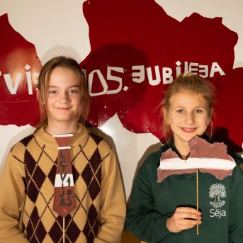 Dziesmu vakars klusinātā gaismā - 