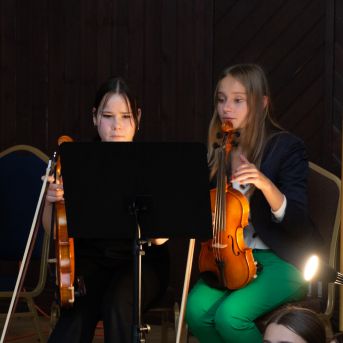 Dziesmu vakars klusinātā gaismā - 