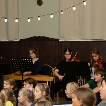 Dziesmu vakars klusinātā gaismā - 