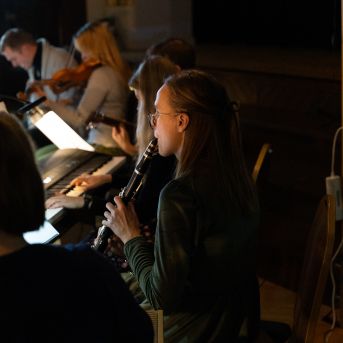 Dziesmu vakars klusinātā gaismā - 