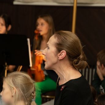 Dziesmu vakars klusinātā gaismā - 