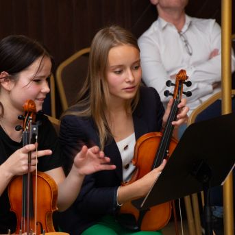 Dziesmu vakars klusinātā gaismā - 