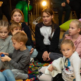 Dziesmu vakars klusinātā gaismā - 