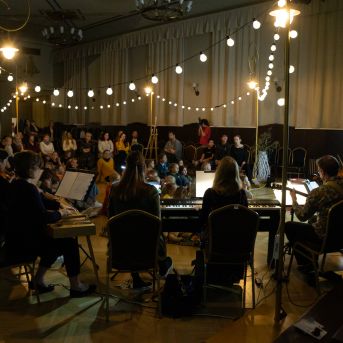 Dziesmu vakars klusinātā gaismā - 