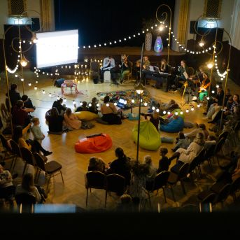 Dziesmu vakars klusinātā gaismā - 