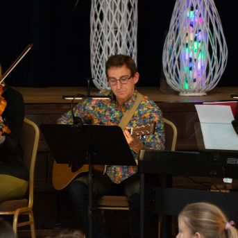 Dziesmu vakars klusinātā gaismā - 