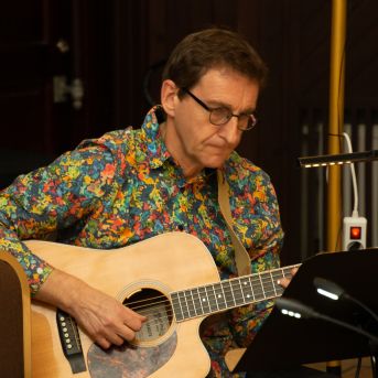 Dziesmu vakars klusinātā gaismā - 