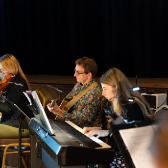 Dziesmu vakars klusinātā gaismā - 