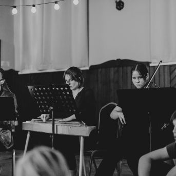 Dziesmu vakars klusinātā gaismā - 